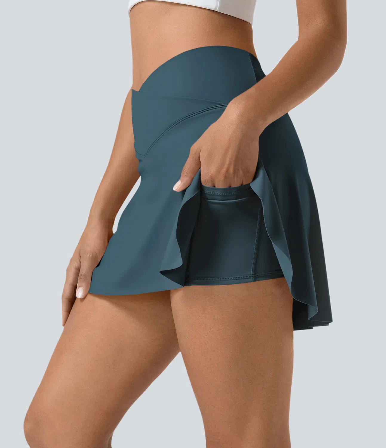 SOFTLYZERO SKIRT - Airy sports skirt with shorts & crossover waistband