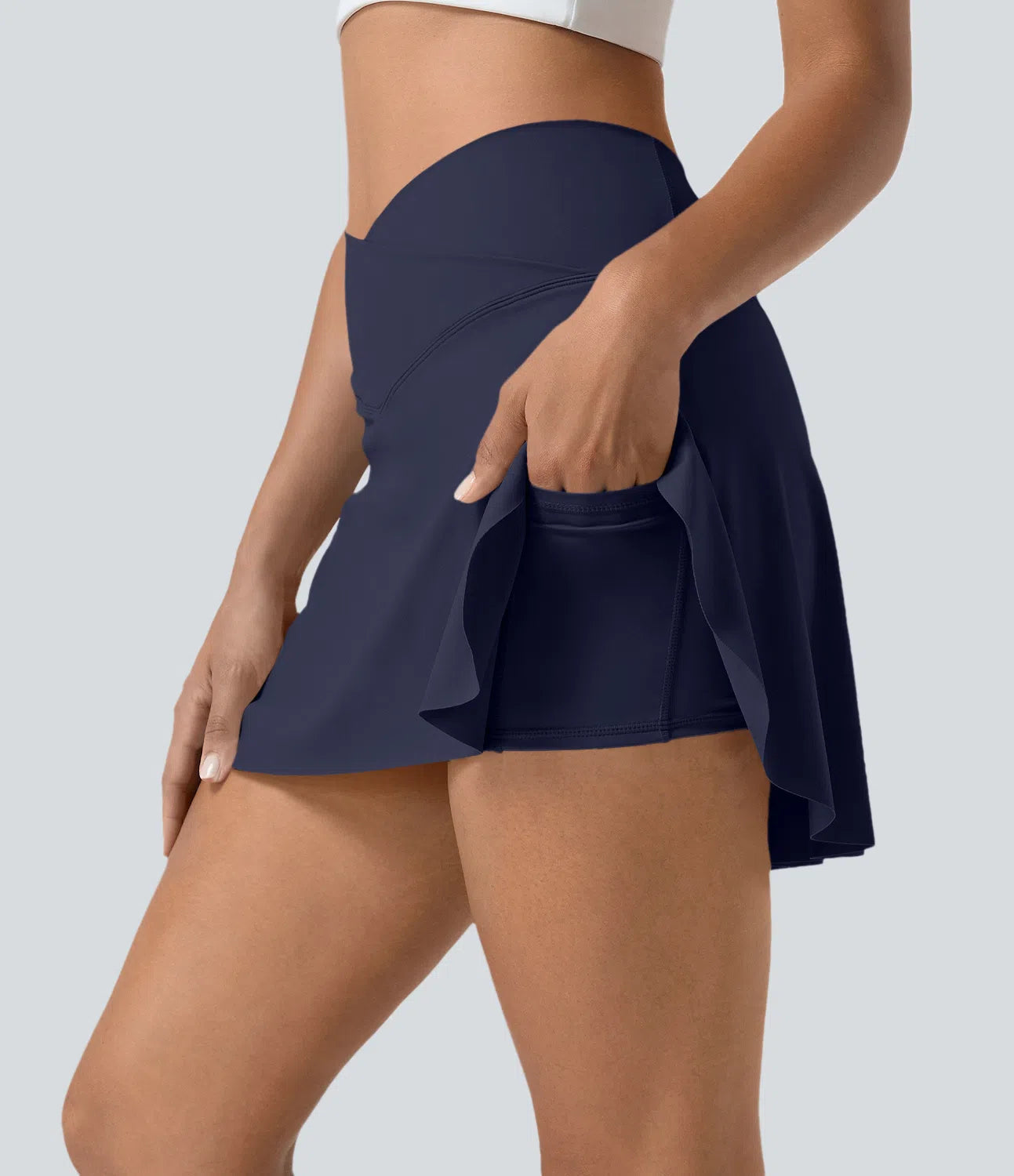 SOFTLYZERO SKIRT - Airy sports skirt with shorts & crossover waistband