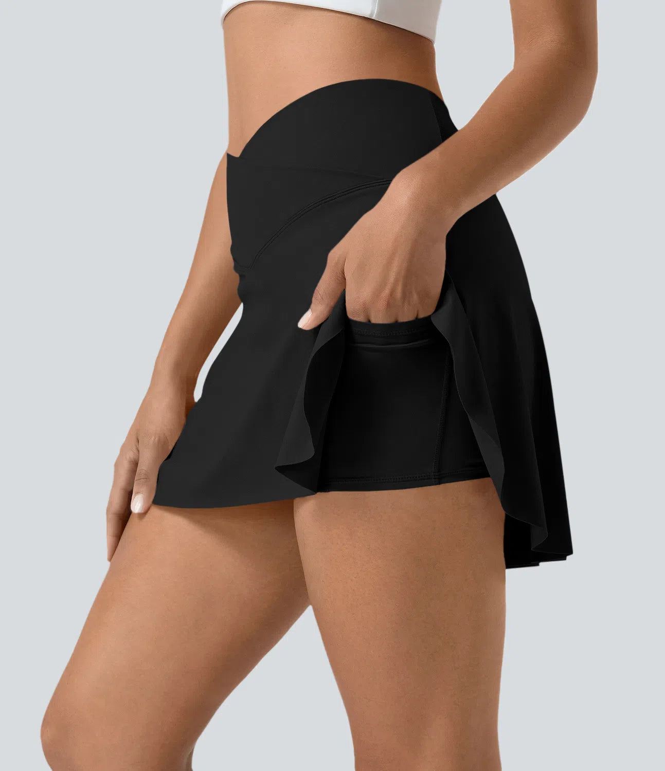 SOFTLYZERO SKIRT - Airy sports skirt with shorts & crossover waistband