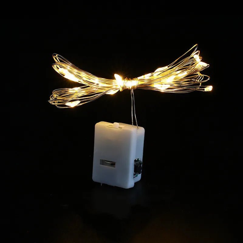 GLIMLIGHT – Warmweiße, batteriebetriebene Lichterkette für Haus und Garten 9