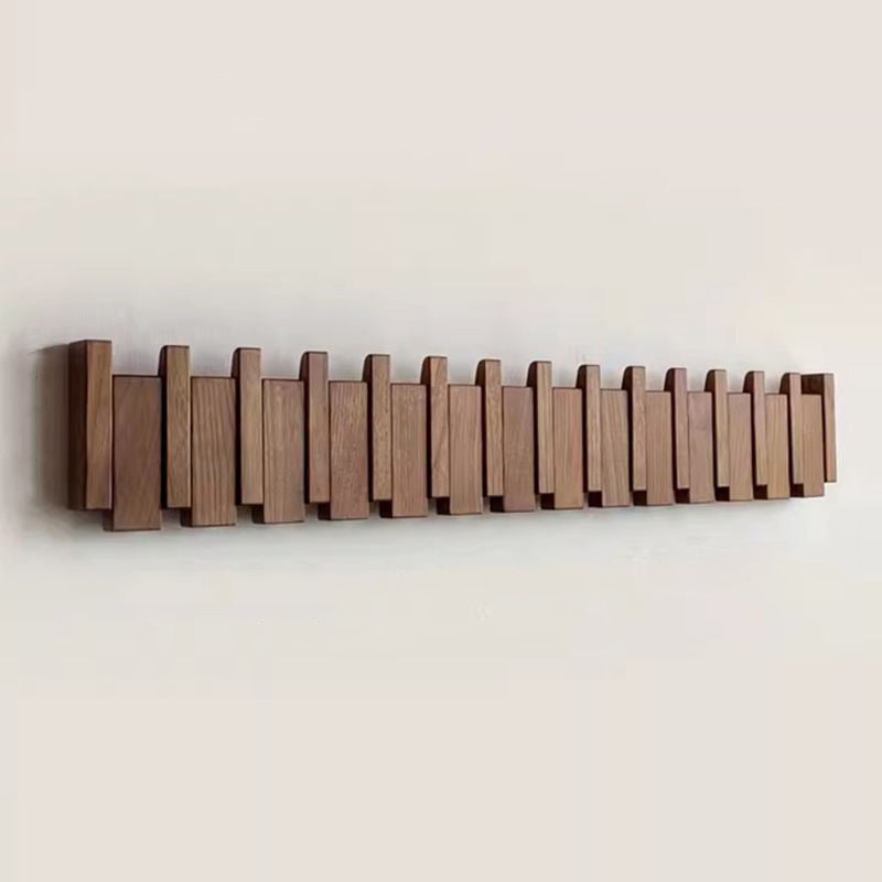 PianoWood - Handcrafted piano-style wall coat rack made from walnut & beech