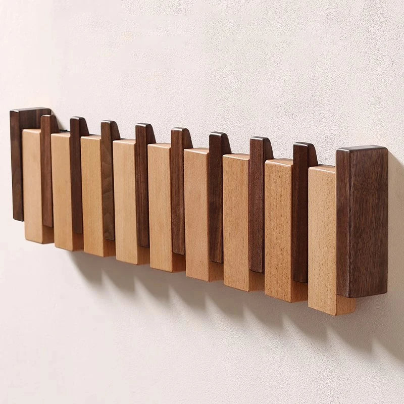 PianoWood - Handcrafted piano-style wall coat rack made from walnut & beech