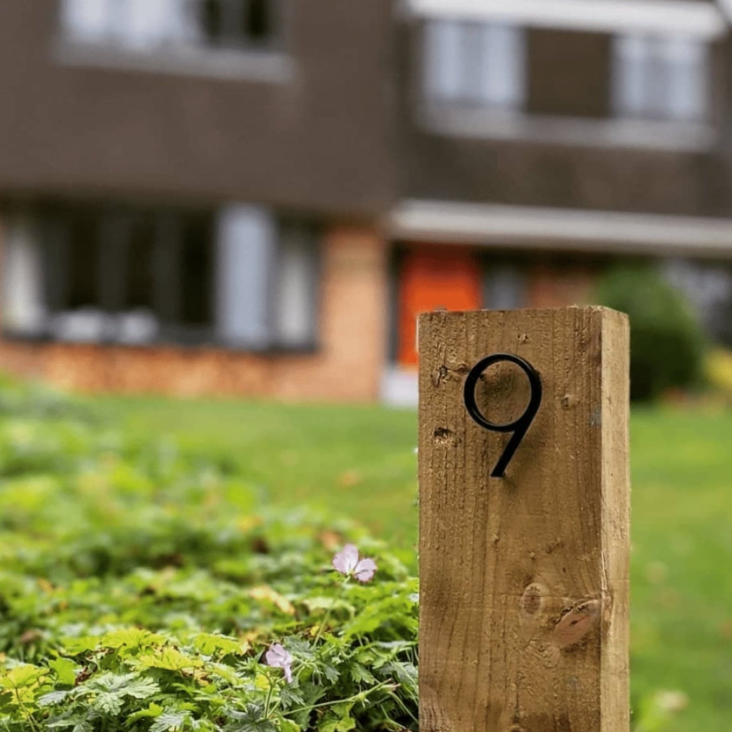 Modern House Numbers - Black house numbers with 3D floating effect for stylish outdoor areas