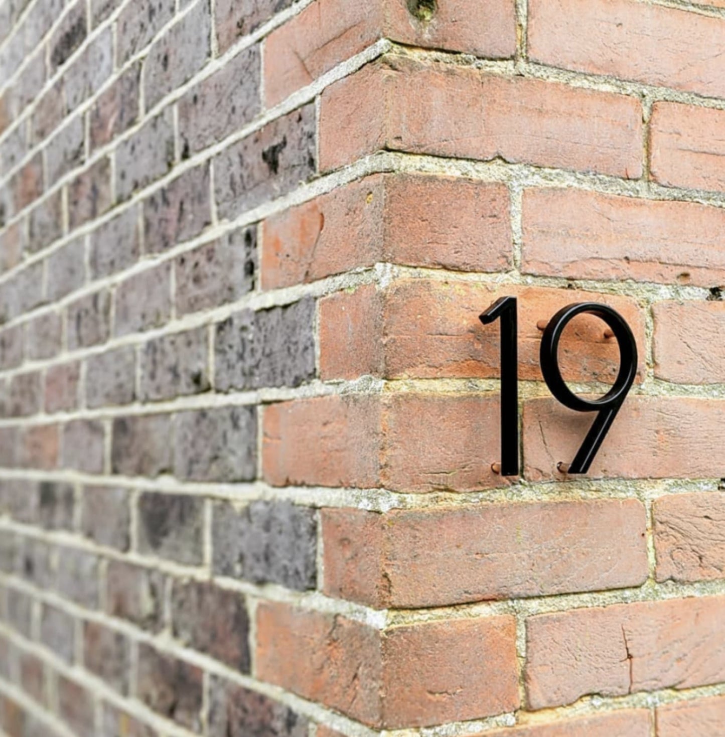 Modern House Numbers - Black house numbers with 3D floating effect for stylish outdoor areas