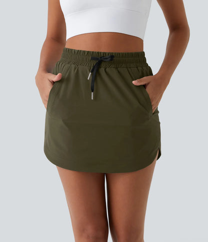 GOLFGLIDE SKIRT – Luftiger 2-in-1 Golfrock mit integrierten Shorts & Kordelzug