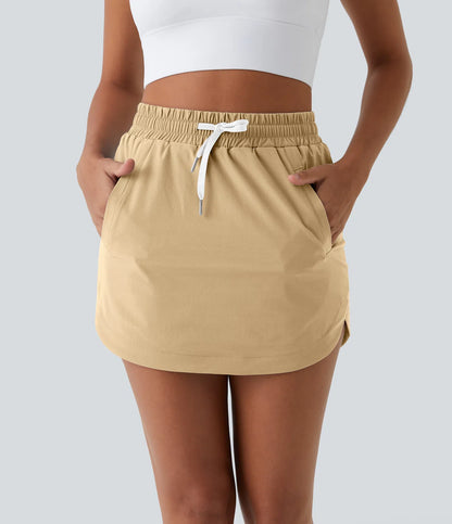 GOLFGLIDE SKIRT – Luftiger 2-in-1 Golfrock mit integrierten Shorts & Kordelzug
