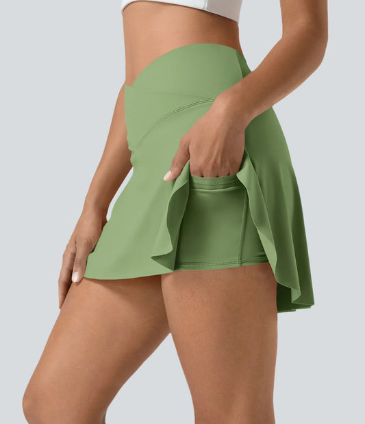 SOFTLYZERO SKIRT - Airy sports skirt with shorts & crossover waistband