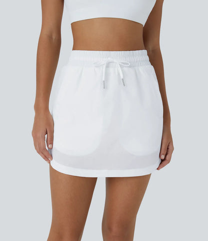 GOLFGLIDE SKIRT – Luftiger 2-in-1 Golfrock mit integrierten Shorts & Kordelzug