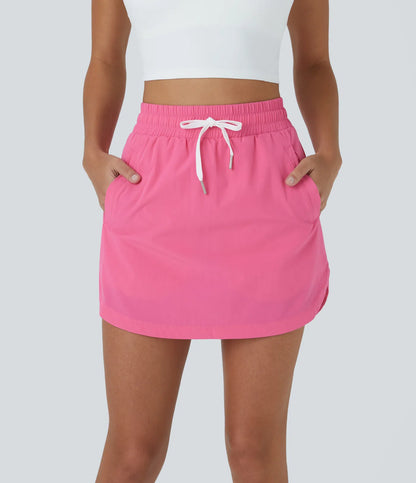GOLFGLIDE SKIRT – Luftiger 2-in-1 Golfrock mit integrierten Shorts & Kordelzug