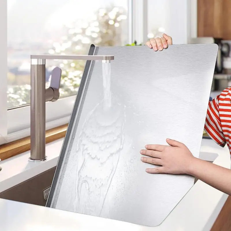 STEELCUT PRO - Stainless steel cutting board with non-slip underside & integrated lip