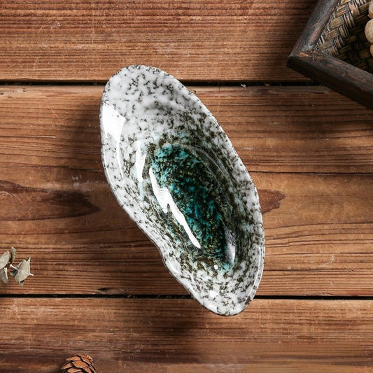Pearlia – Shell-shaped ceramic tableware for elegant occasions