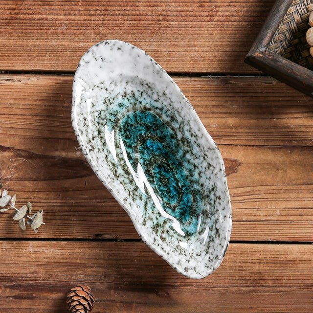 Pearlia – Shell-shaped ceramic tableware for elegant occasions