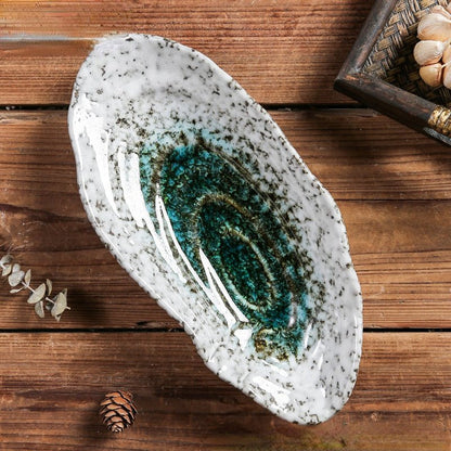 Pearlia – Shell-shaped ceramic tableware for elegant occasions