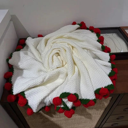 FLORAVA – Manta artesanal con diseño de rosas
