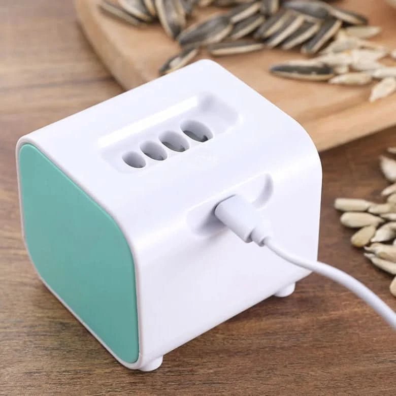 CRACKORA – Aide automatique pour éplucher les pépins de melon avec design portable