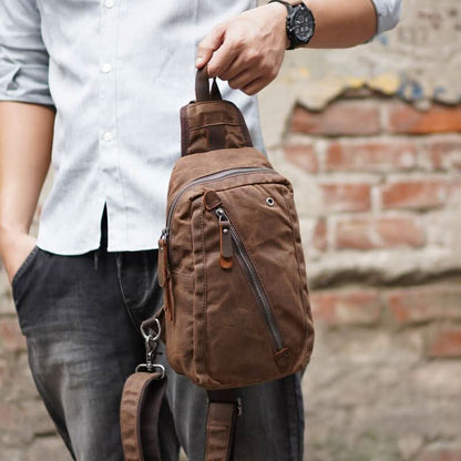 RUGVANA – Sac à dos bandoulière en toile cirée avec design étanche et plusieurs compartiments