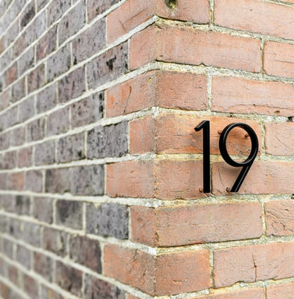 Modern House Numbers - Black house numbers with 3D floating effect for stylish outdoor areas