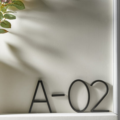 Modern House Numbers - Black house numbers with 3D floating effect for stylish outdoor areas